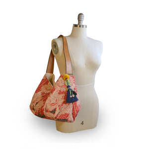 Floral print tote with kantha stitching on a mannequin, Vivienne Kantha Tote.