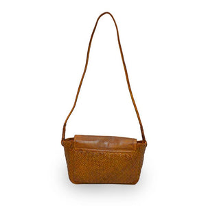 Back of brown woven leather bag with smooth flap, Sawyer Woven Shoulder Bag.
