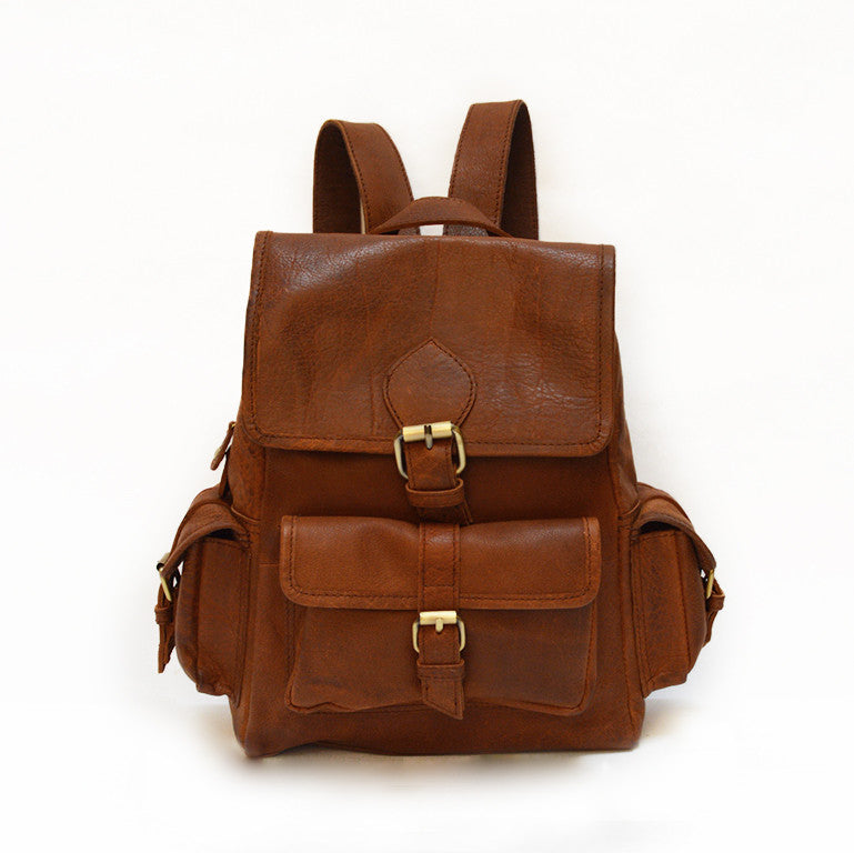 Small brown leather backpack, front view, adjustable straps, Sadie Leather Backpack.