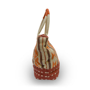 Side view of an orange fabric tote, Cara Fabric Tote.