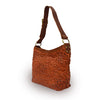 Rust leather shoulder bag with handle up, quilted floral detail, Cari Quilted Shoulder Bag.