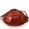 Interior view of rust leather bag, Cari Quilted Shoulder Bag.