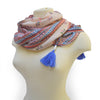 Pink flower scarf with blue tassels on mannequin, Brigitte Flower Scarf. 